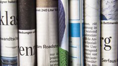 Stack of folded newspapers